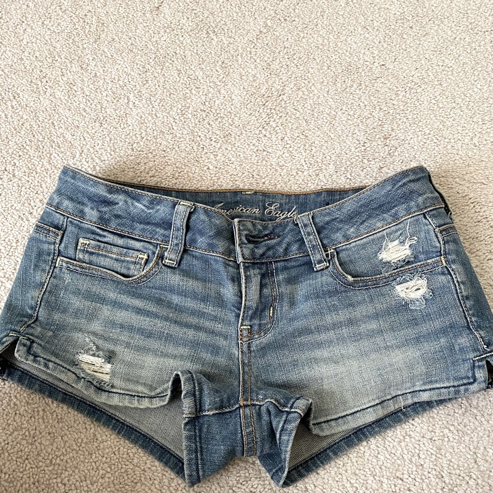 blue distressed low rise shorts